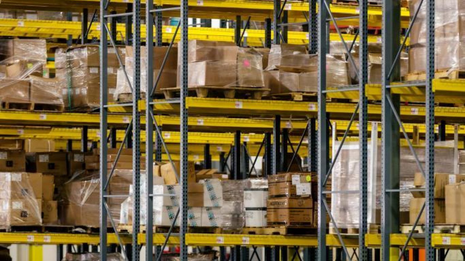 Boxes on warehouse shelves 683x1024
