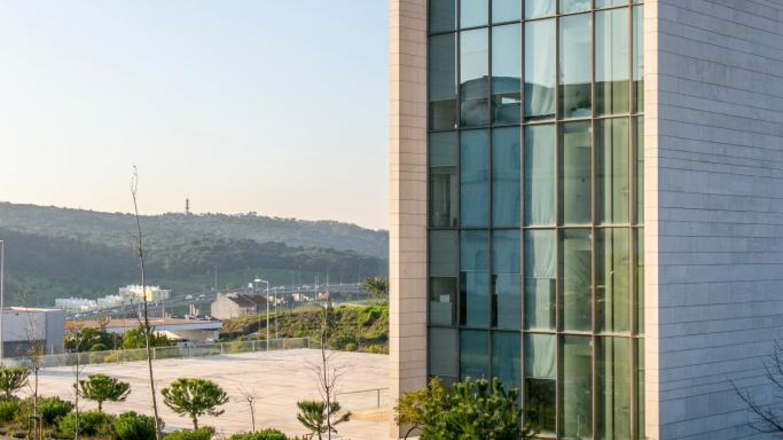 Lisbon university building with glass windows 683x1024